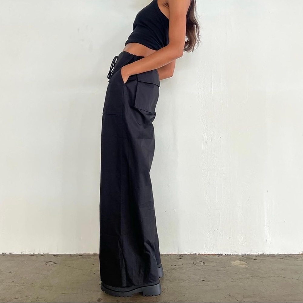 Local European black parachute pants